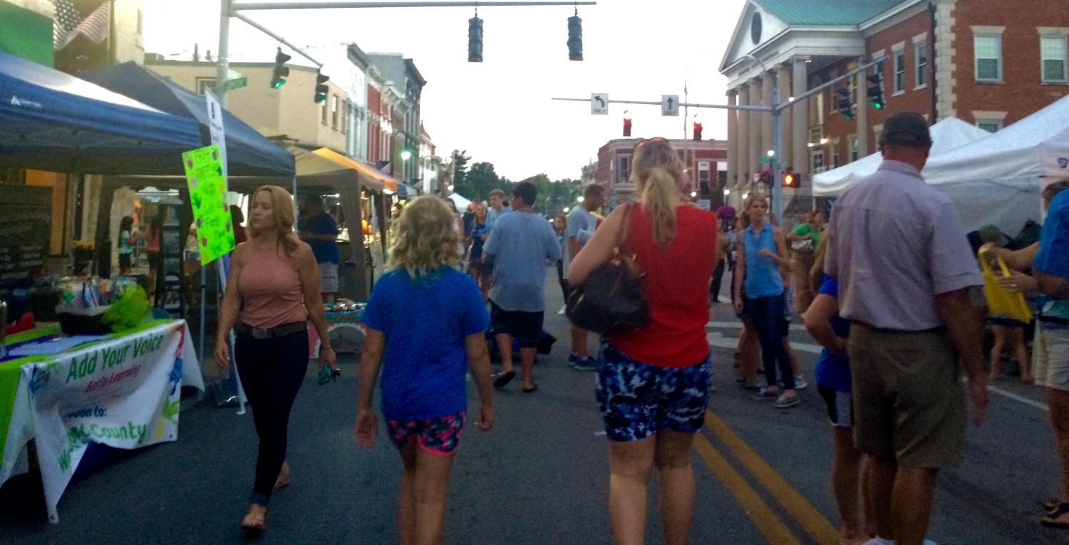 People stroll down the street during the Twilight Festival. (Image Source : Claire Pinkston)