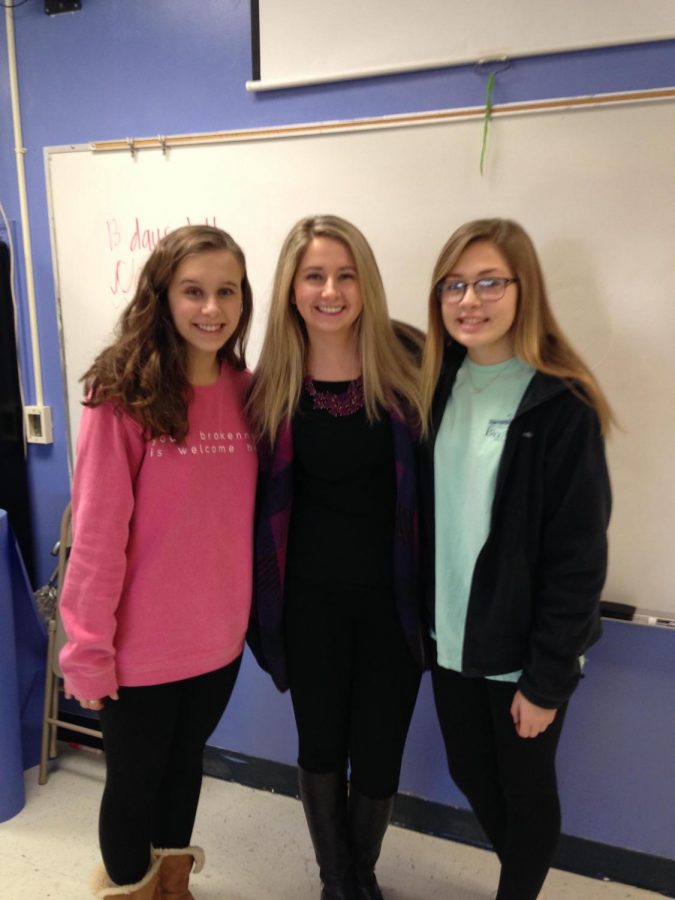 Ms. Moffet poses with two of her favorite students Anna Shryock (right) and Olivia Back (left)