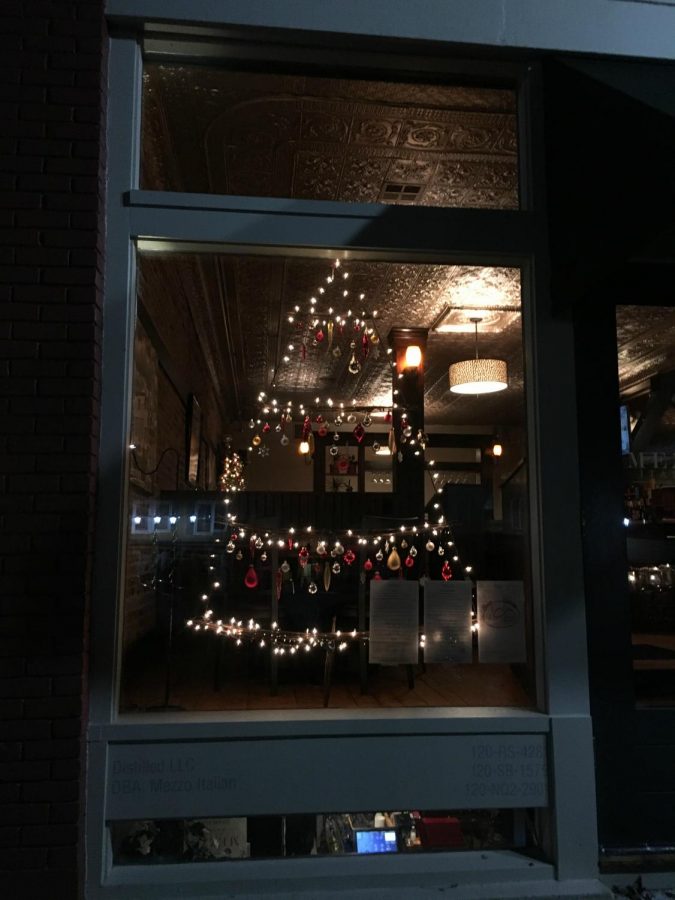In the window of Mezzo, a local restaurant, these lights in the window are shaped like Christmas Trees. 