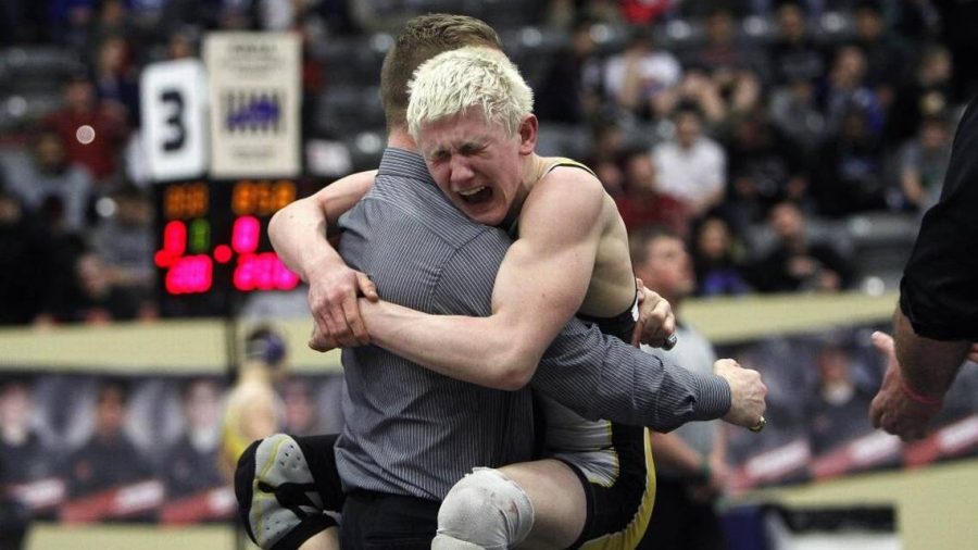 Tylan Tucker emotional after winning 126 weight class at State.