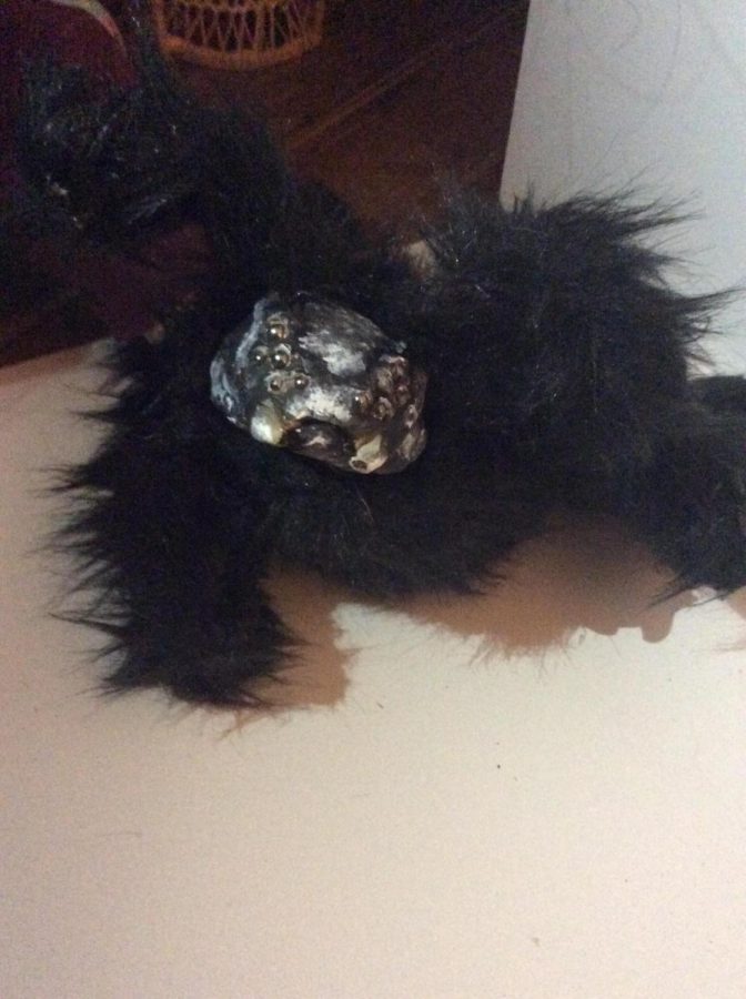 Giant Spider Clay, fake fur,  paint, wire, aluminum foil, and cotton batting. 
