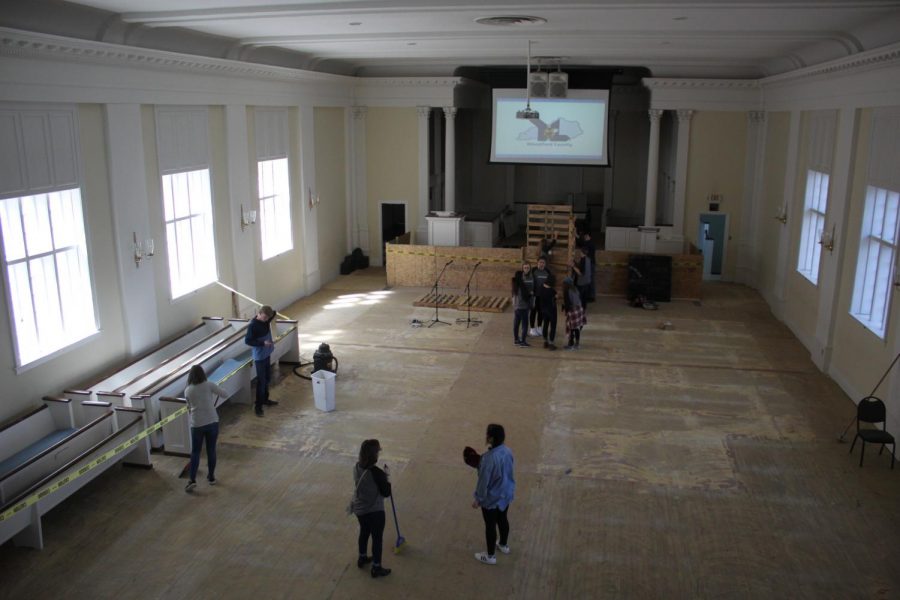 The before image of the Gallerie, as Community Activism students work to put the space together.