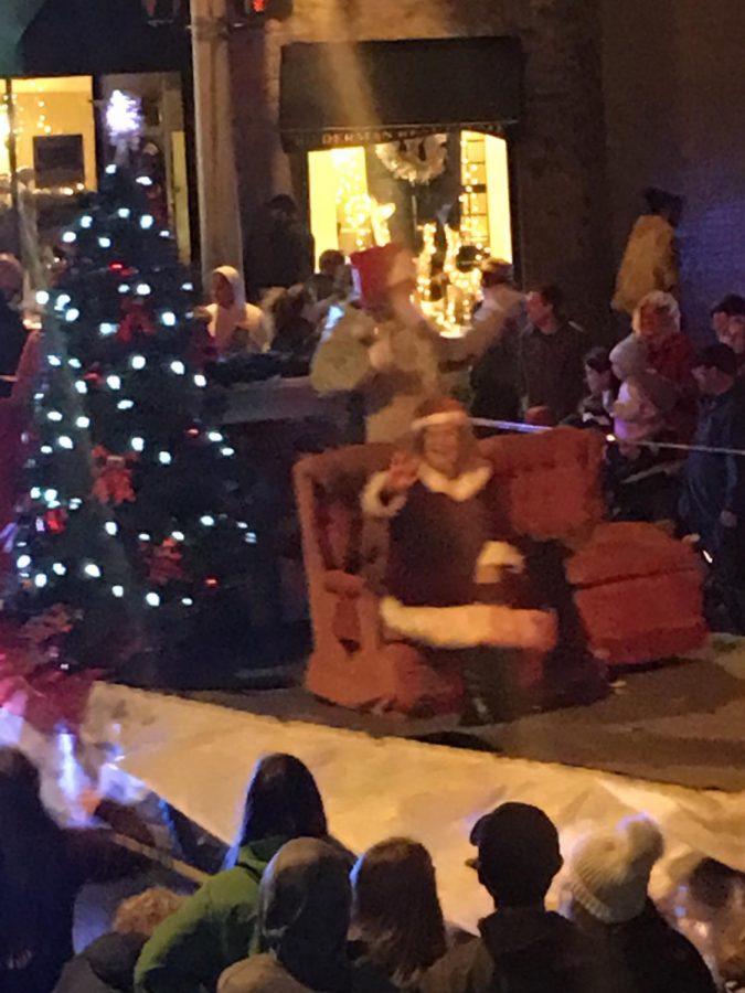 Santa and Mrs. Claus,  come to visit the children on the last float of the Versailles Christmas Parade.  