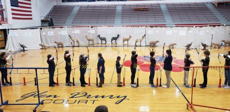 The Archery Team shoots a practice round. Photo by Morgan Fitzpatrick.
