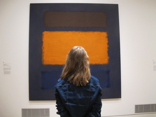Tara Rapoport (10) in front of Orange, Blue, Brown on Maroon by Mark Rothko, painted in 1963. The medium used is oil on canvas.