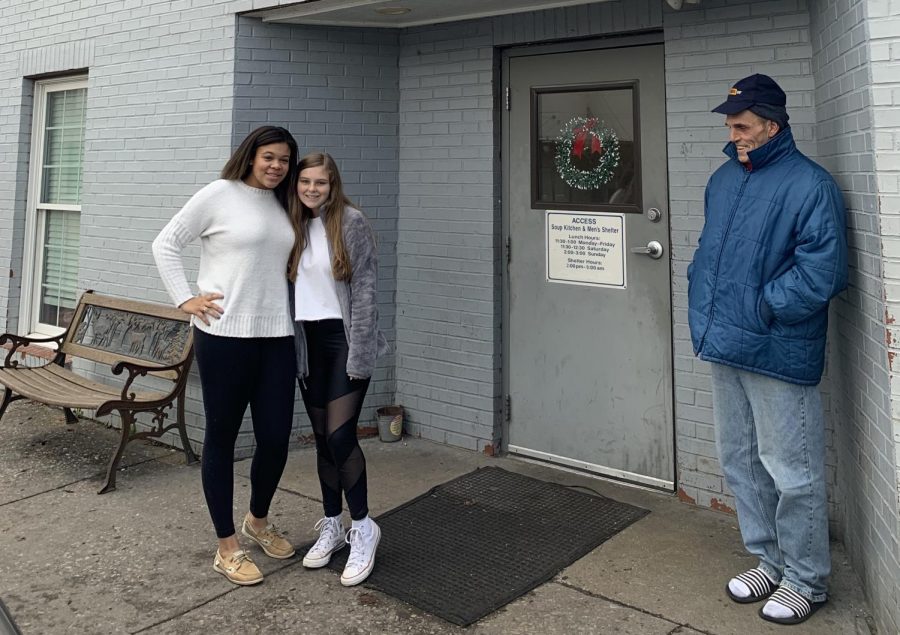 Olivia Smith and Michaela Agee outside ACCESS Soup Kitchen after turning in donations 