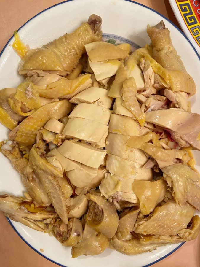 A plate of bai qie ji or poached chicken is eaten at the Lunar New Year meal as a symbol of reunion and rebirth.