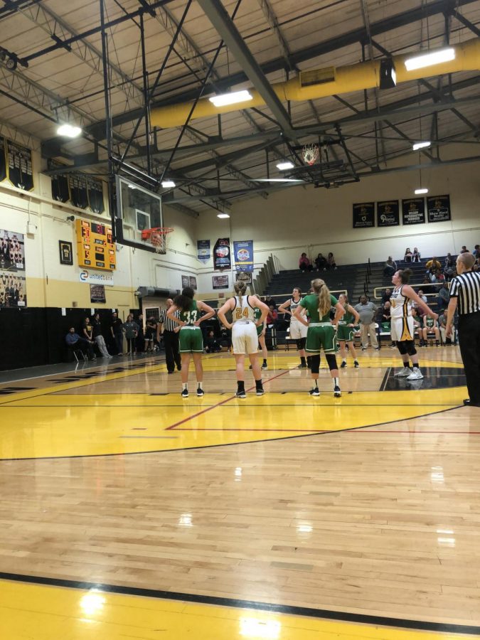 Delaney Enlow (12) shoots a free throw and earns her team another point. 