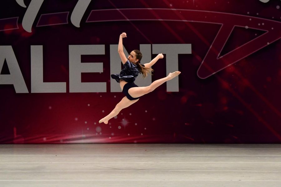 Julia Huff seems to float in the air during her dance routine.