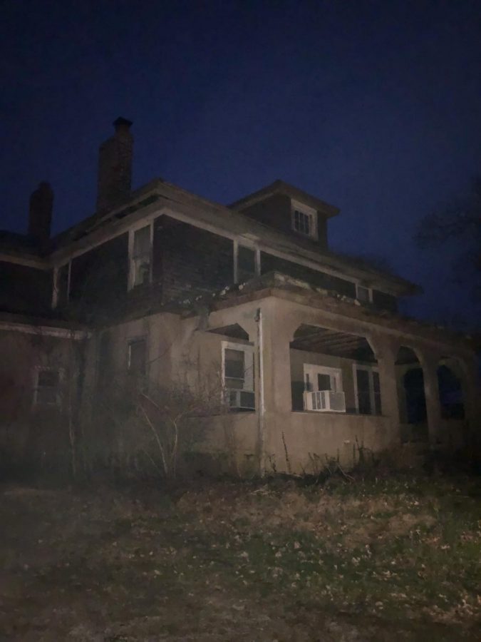 This picture was taken of my uncles farmhouse  at midnight. It gave me this off feeling when I saw it.