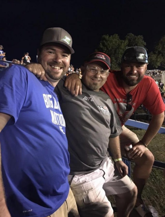 Michael Agee attending a dirt track race with his family, one of his hobbies.