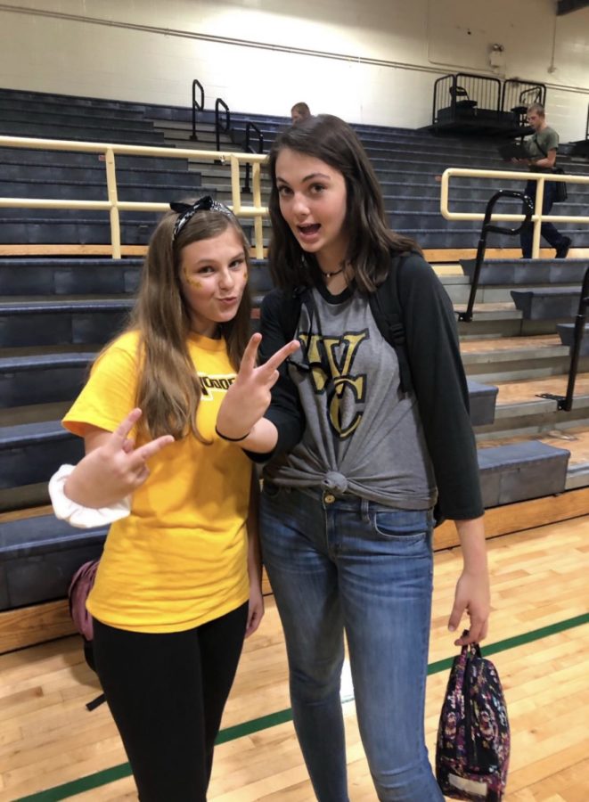 Olivia DeVore and Michaela Agee showing school spirit on pep rally day.