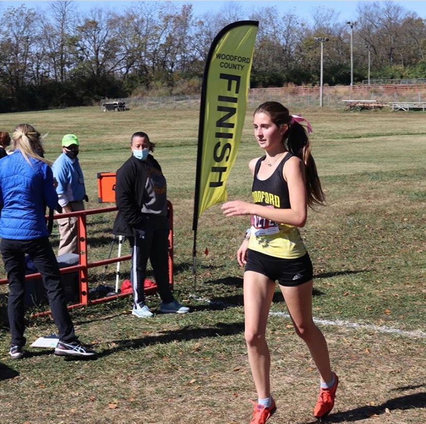 McKenna completing her race at the Woodford County Invitational.