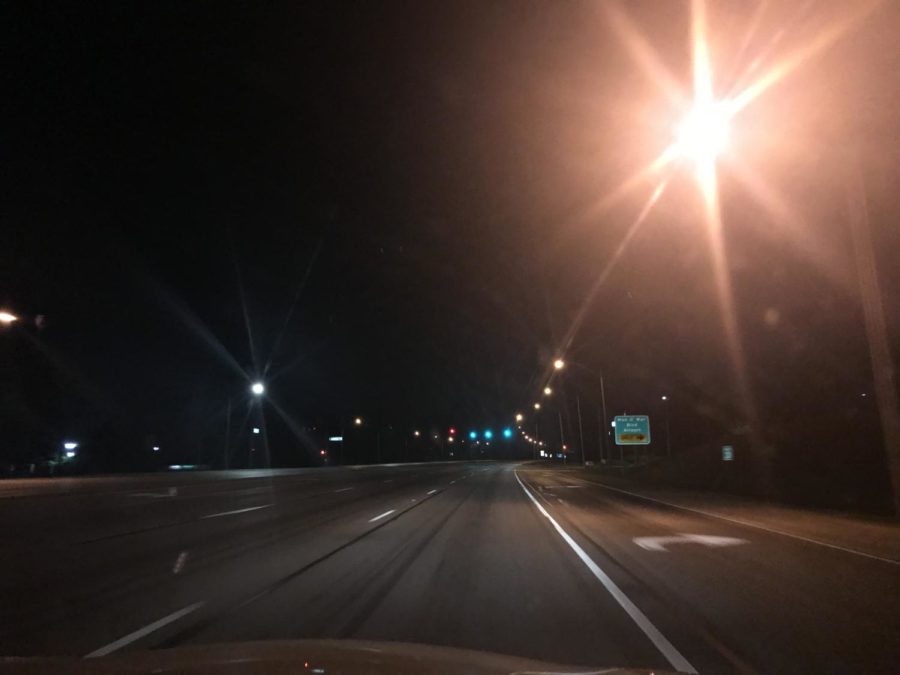 Empty roads and lights fill the air at the Blue Grass Airport area. One of the rarest times of clear roadways in Lexington. Taken at 12:25 am. 