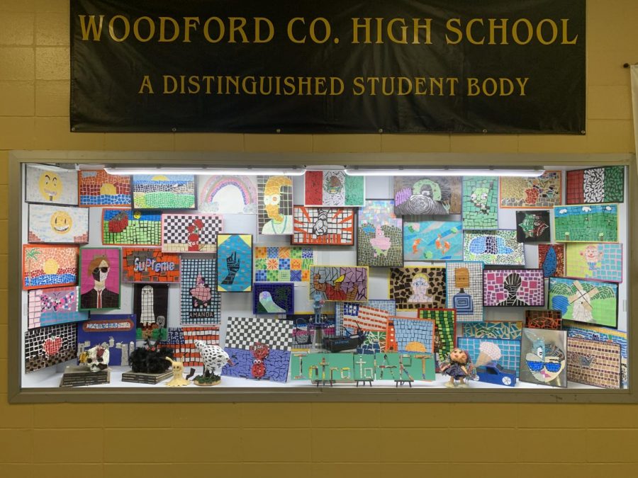 Main Entrance Art Display. This display case is brightly lit up and highlighted in the main entryway of the school. It showcases the artworks of WCHS art students. Its a beautiful display that demonstrates the artistic ability of WCHS students to visitors of the school.