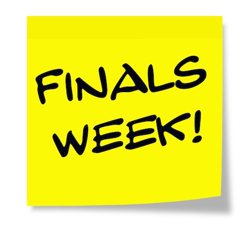 A yellow post-it note which reads: Finals Week!