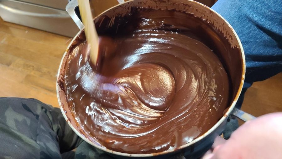 Stir until mixture cools enough to add vanilla.