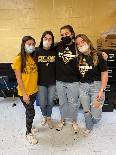 Mia Vanhoose (11), Marine A. (11), Sydney Paul (11), and Maura Wyatt (11) stand proud with their Woodford gear for Extreme Spirit Day.