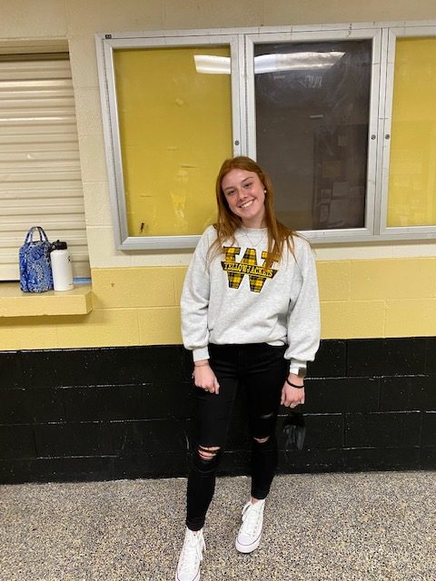 Addie Biles (10) shows her school spirit with her cute Woodford sweatshirt.