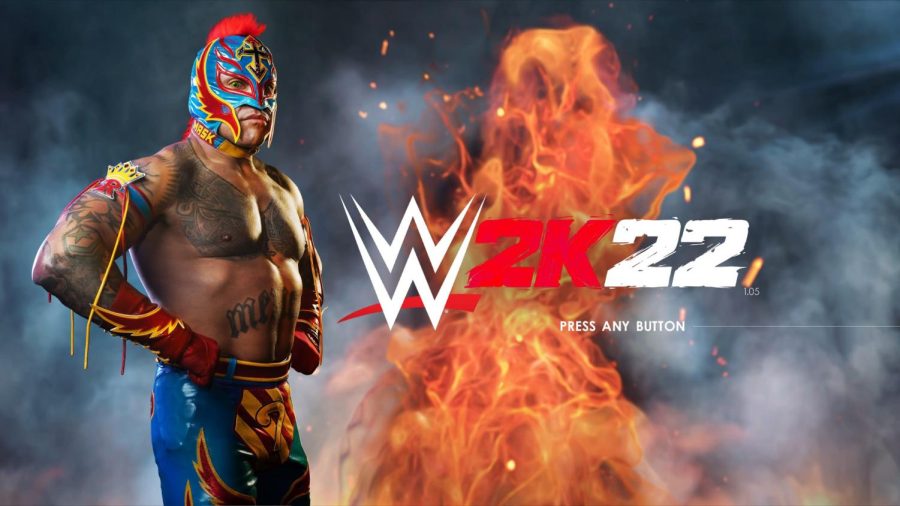 The WWE 2K22 start screen, featuring the cover star, and showcase star, Rey Mysterio.