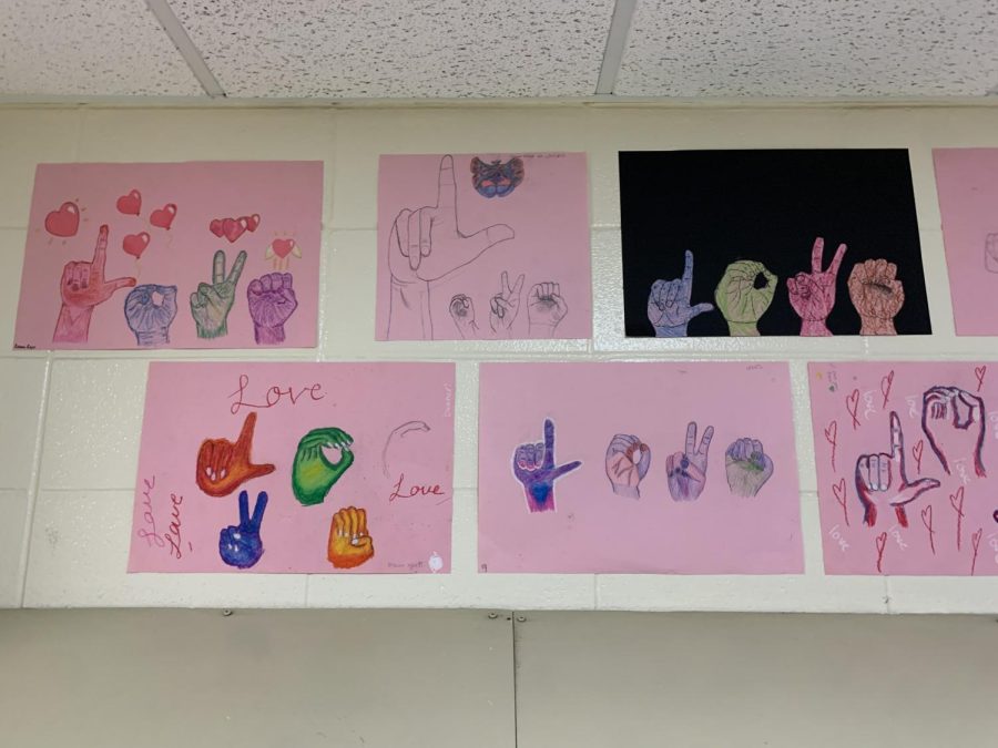 Drawing 1 G4: Drawing the word LOVE in sign language.