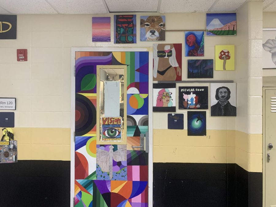 Front door of the art room, with oil paintings all around it from G3, Painting .