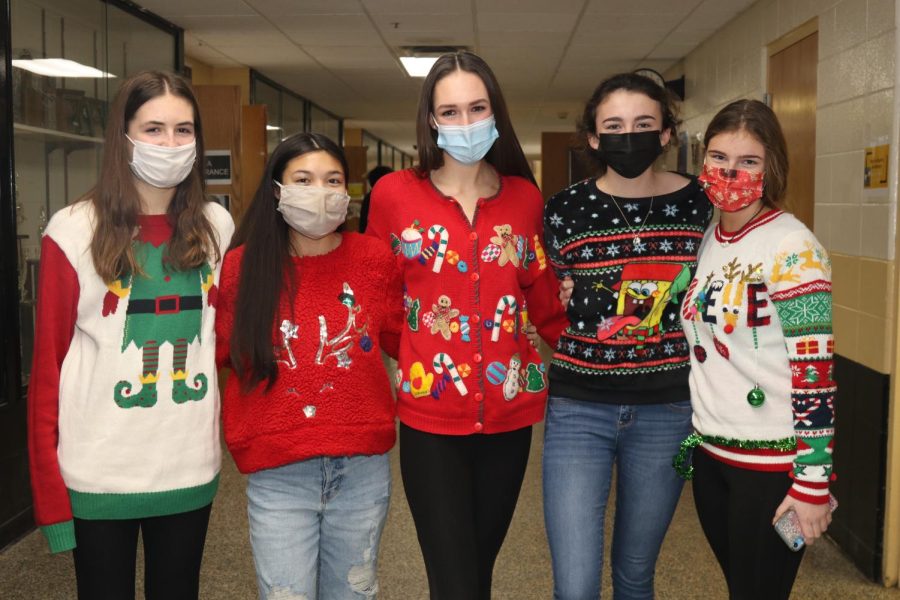 Ugly Sweaters are the best sweaters when it comes to Christmas Spirit week. WCHS students Deanna Burns (11), Abigail Santos (12), Morgan Reynolds (12), Maggie McSorley (12), and Bri Lacefield (12) pose for a festive picture during spirit week.