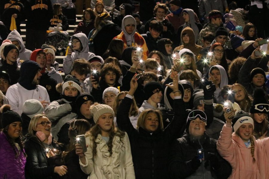 Friday Night Lights-- WCHS students light up the field with spirit while showing out during a chilly game. 