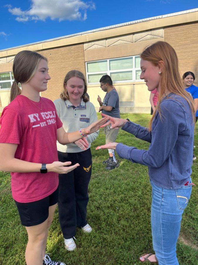 Members, Addie Biles and Samara Miller play a round of Rock paper scissors at the FCCLA Welcome Party. 