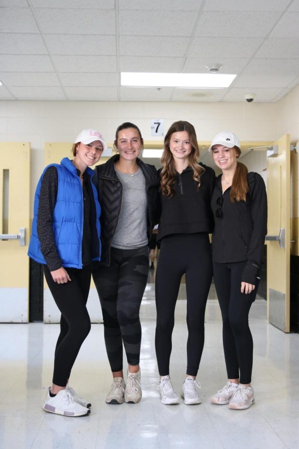 Got any snacks? Students pose in their soccer mom outfits!