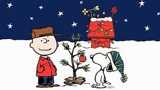 Charlie Brown and Snoopy decorate their Christmas tree