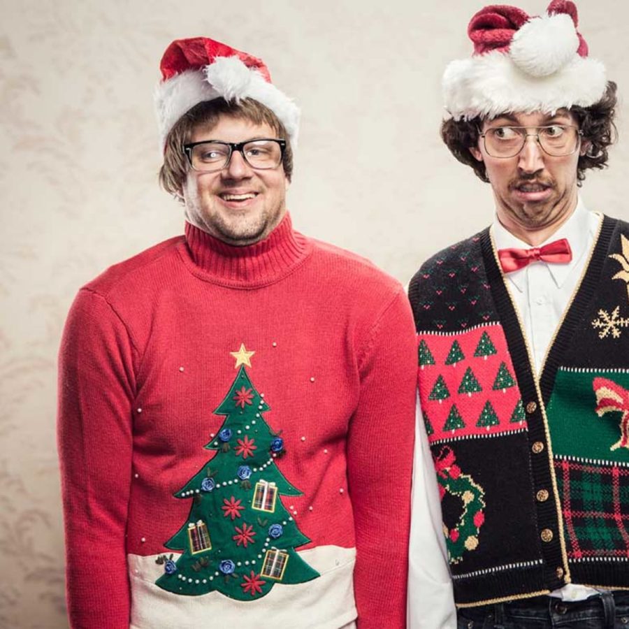 Two Guys wearing ugly Christmas sweaters 