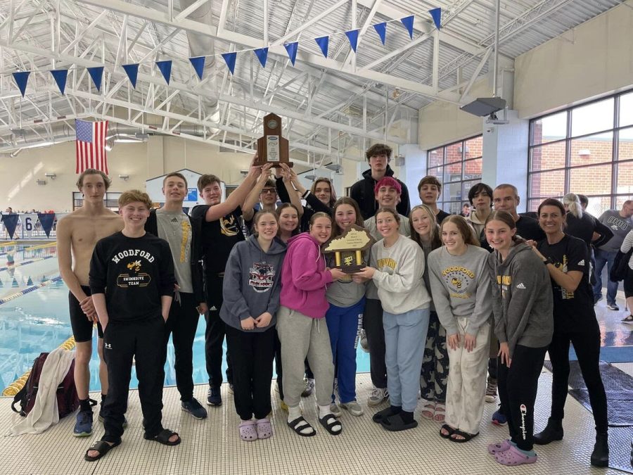 Regionals%2C+day+two%3A+Woodford+County+HS+boys+and+girls+swim+team+%28not+all+pictured%29%2C+hold+trophies+at+KHSAA+Region+6+Swim+and+Dive+Championships.+