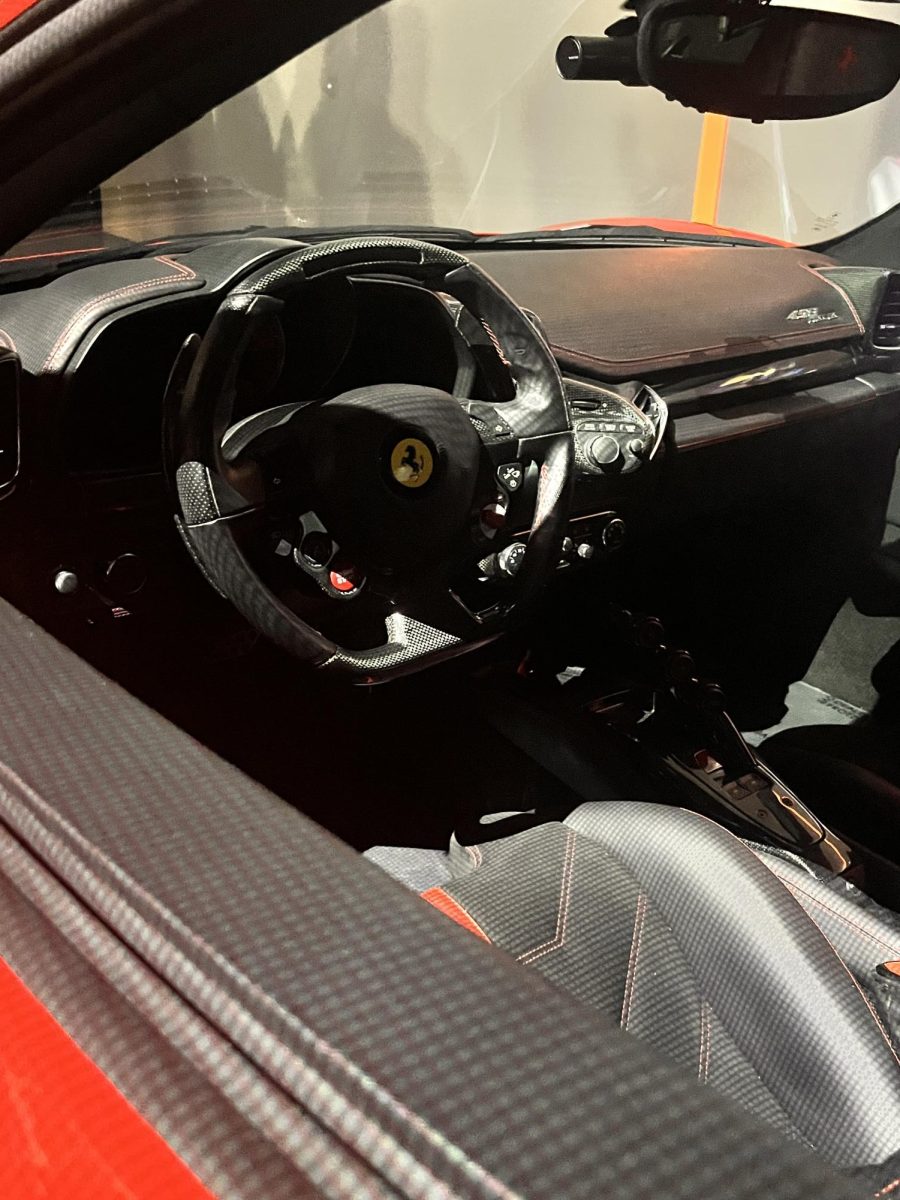 Interior and steering wheel of Ferrari 458.