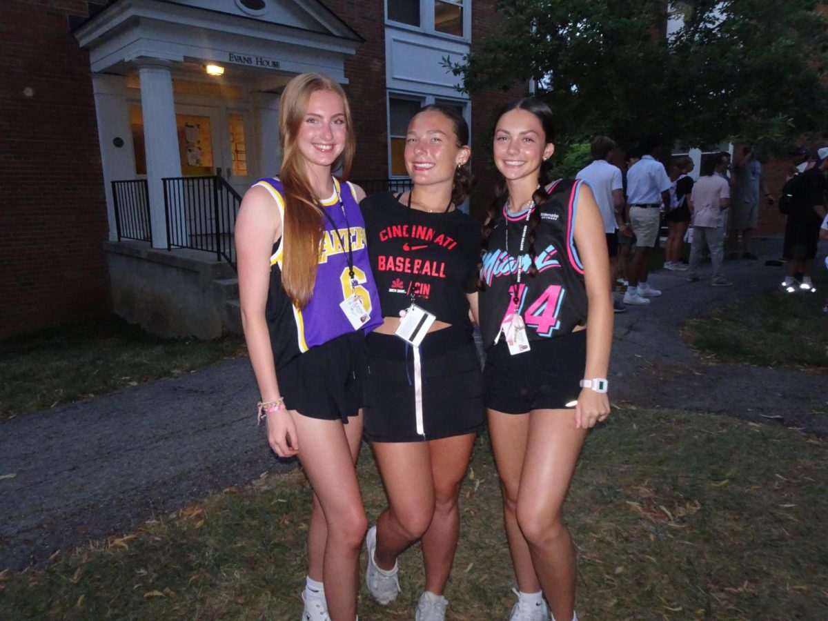 Mallory Jones, Lily Slayton, and Claire Ramsey (pictured left to right) before heading to the "Scholar v.s. Baller" dance. 