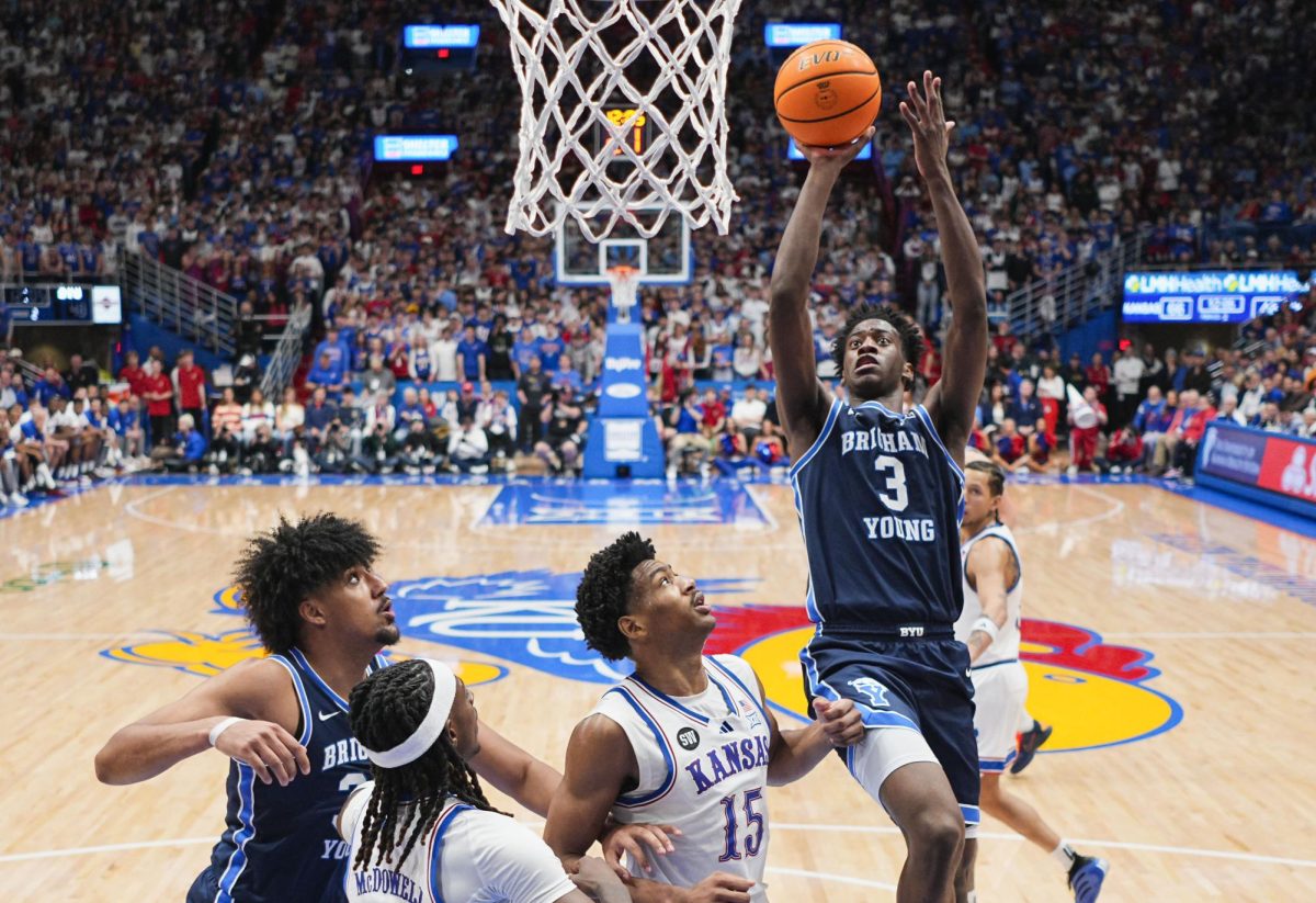 BYU Cougars forward AJ Dybantsa (3) shoots against Kansas Jayhawks forward Bryson Tiller (15)Credit: Jay Biggerstaff-Imagn Images
