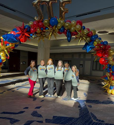 WTYA members after filming social media content at the JTF balloon arch
